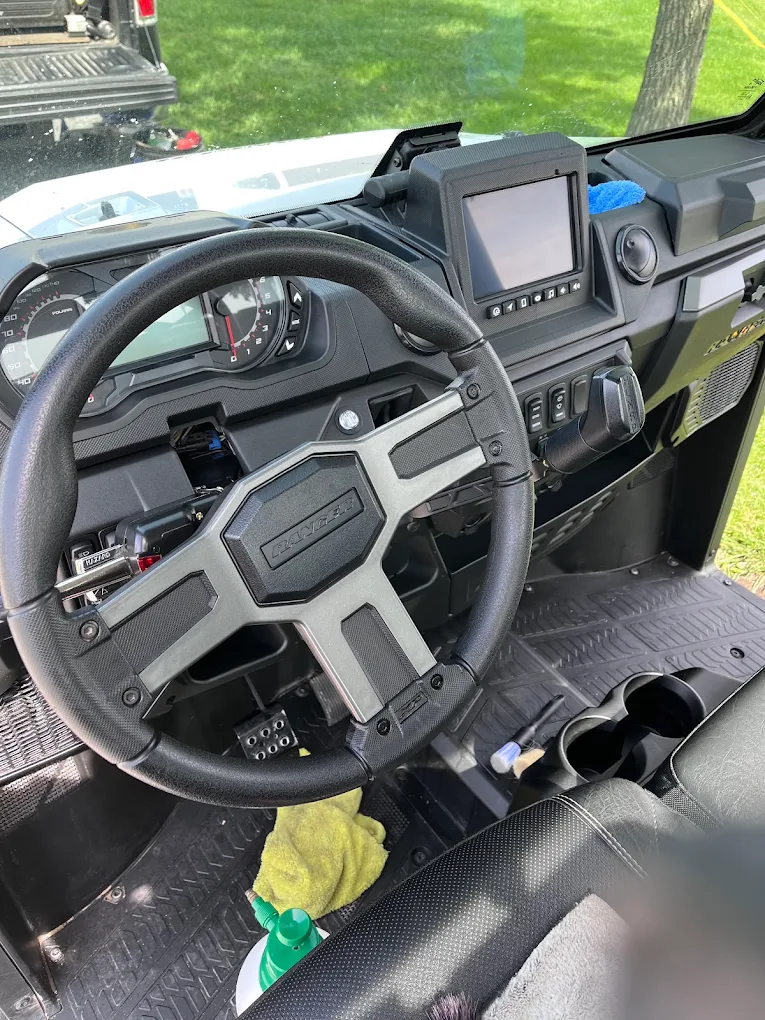 Utility vehicle cabin during detailing